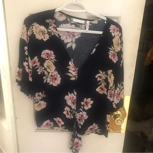 Short sleeved loose fitting V neck top